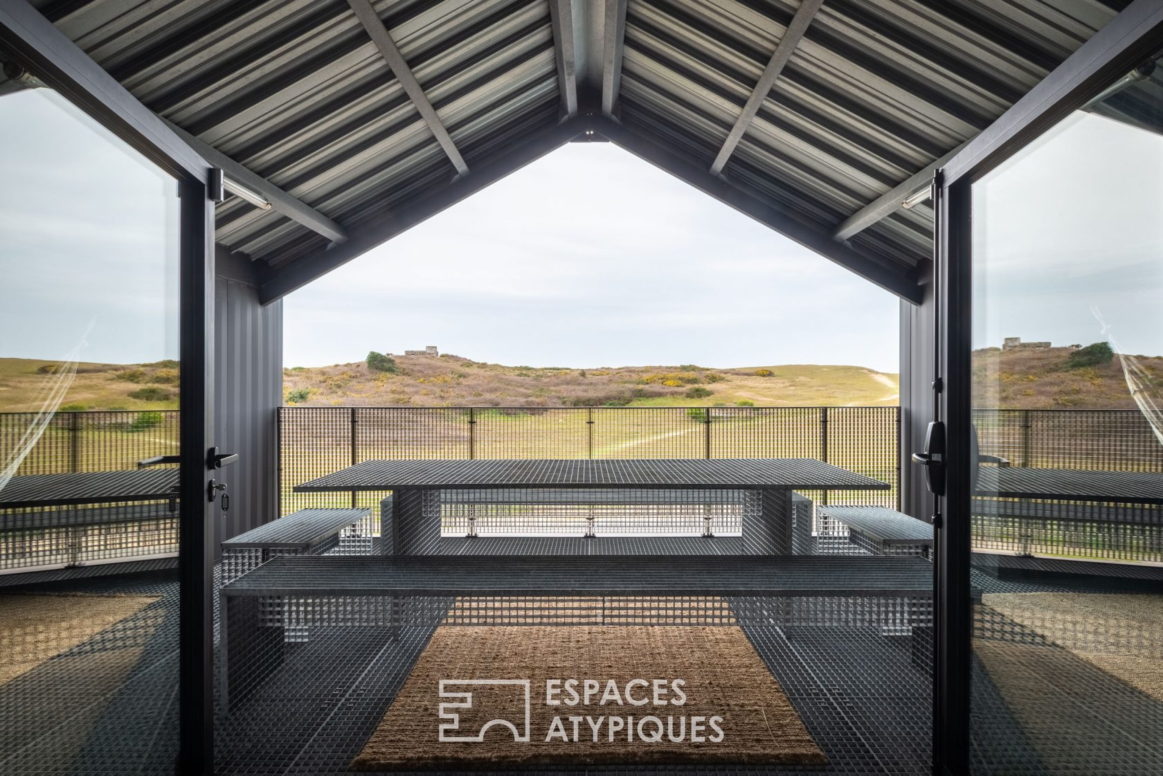 Metal house with sea view