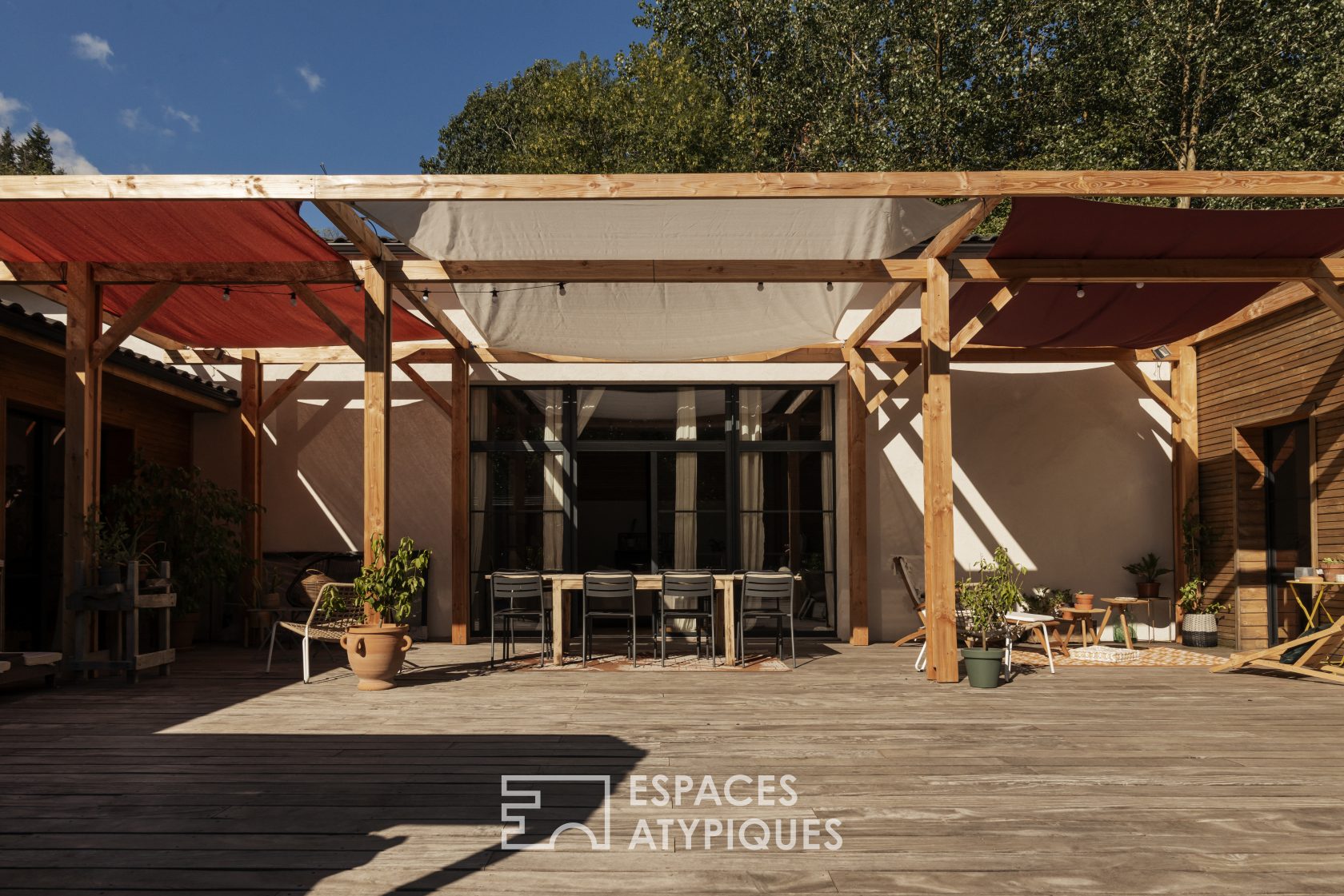 Decorative house with wooden terrace