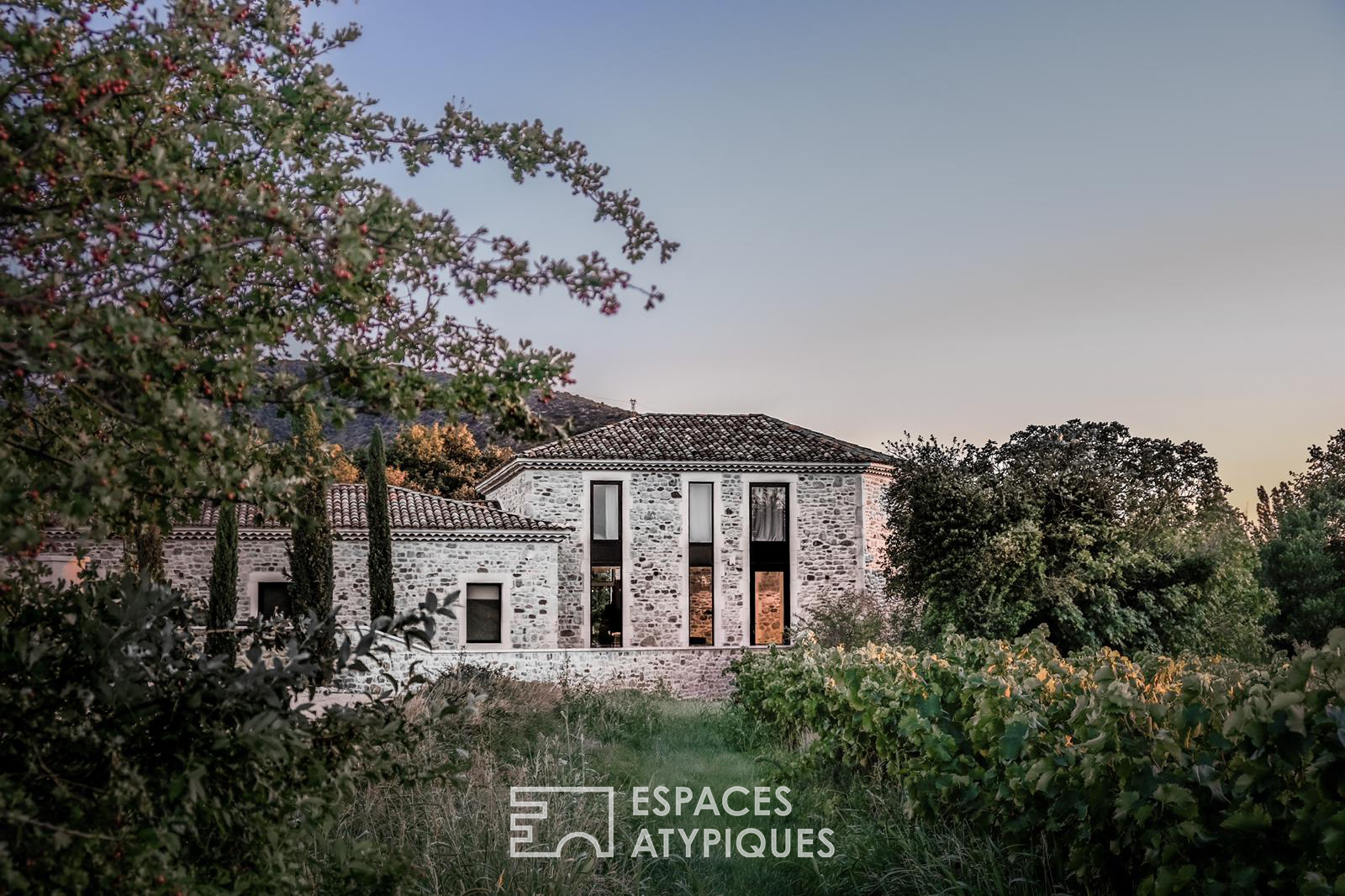 Estate with contemporary stone farmhouse