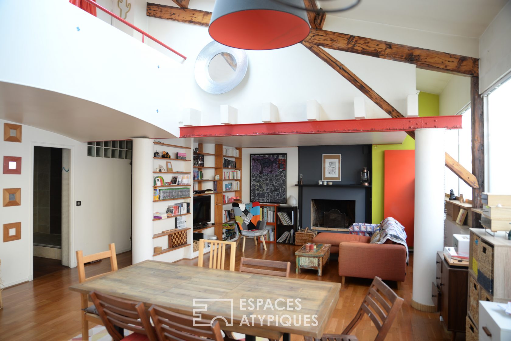 Colorful loft with exposed beams