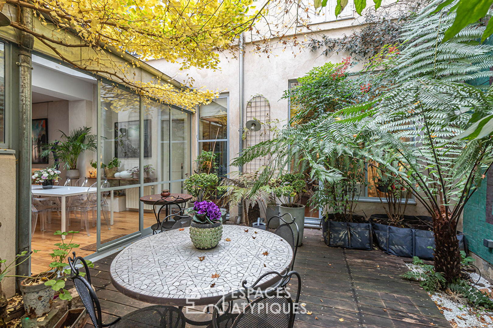 Loft in a former printing house with patio