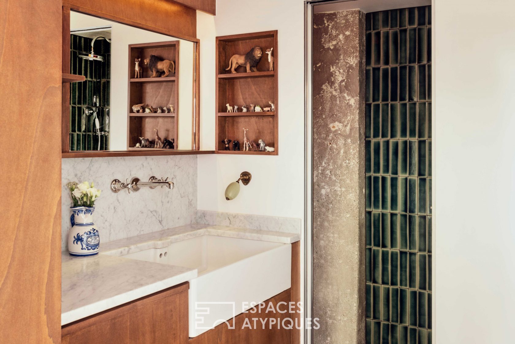 House with photo studio in raw and seventies style