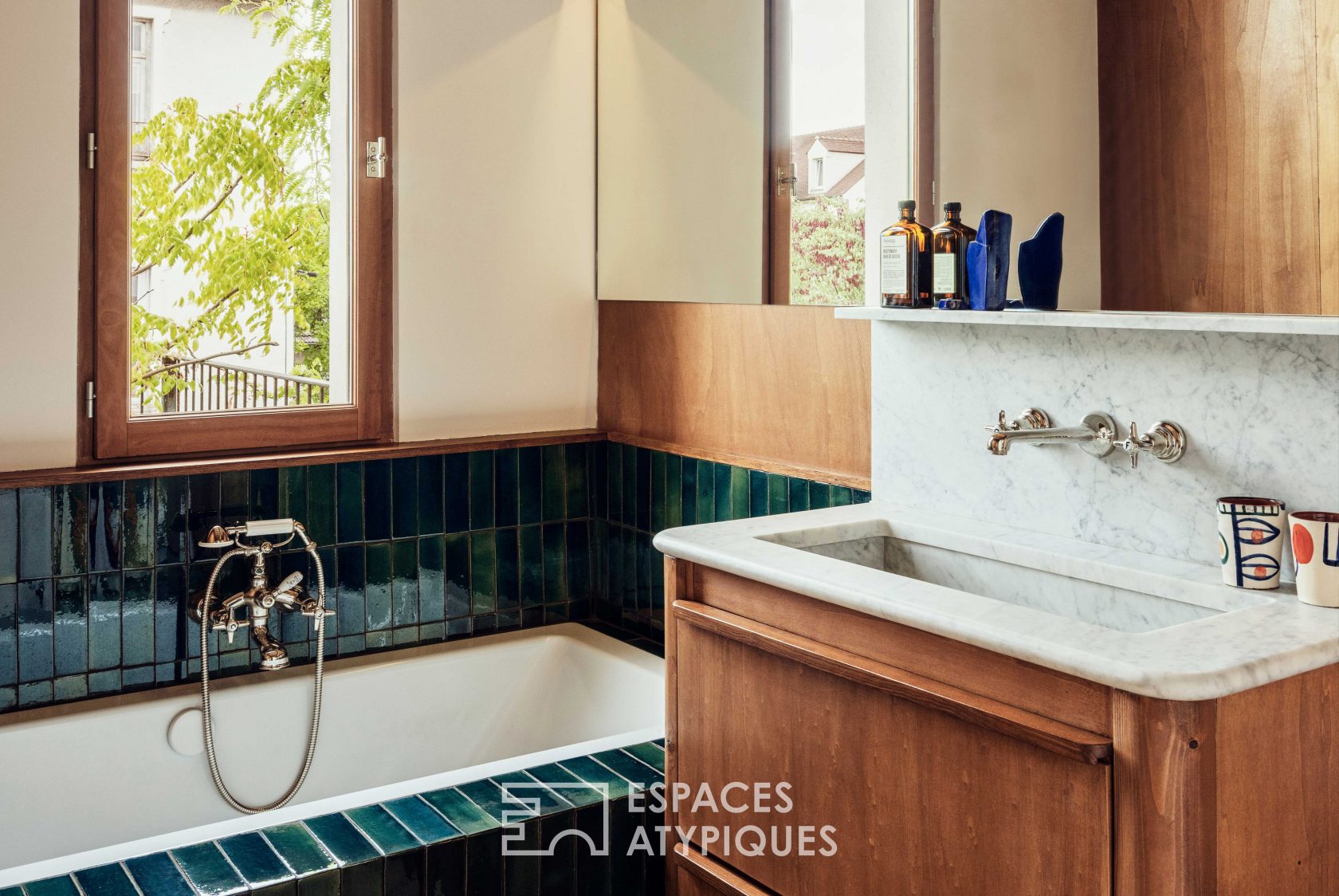 House with photo studio in raw and seventies style