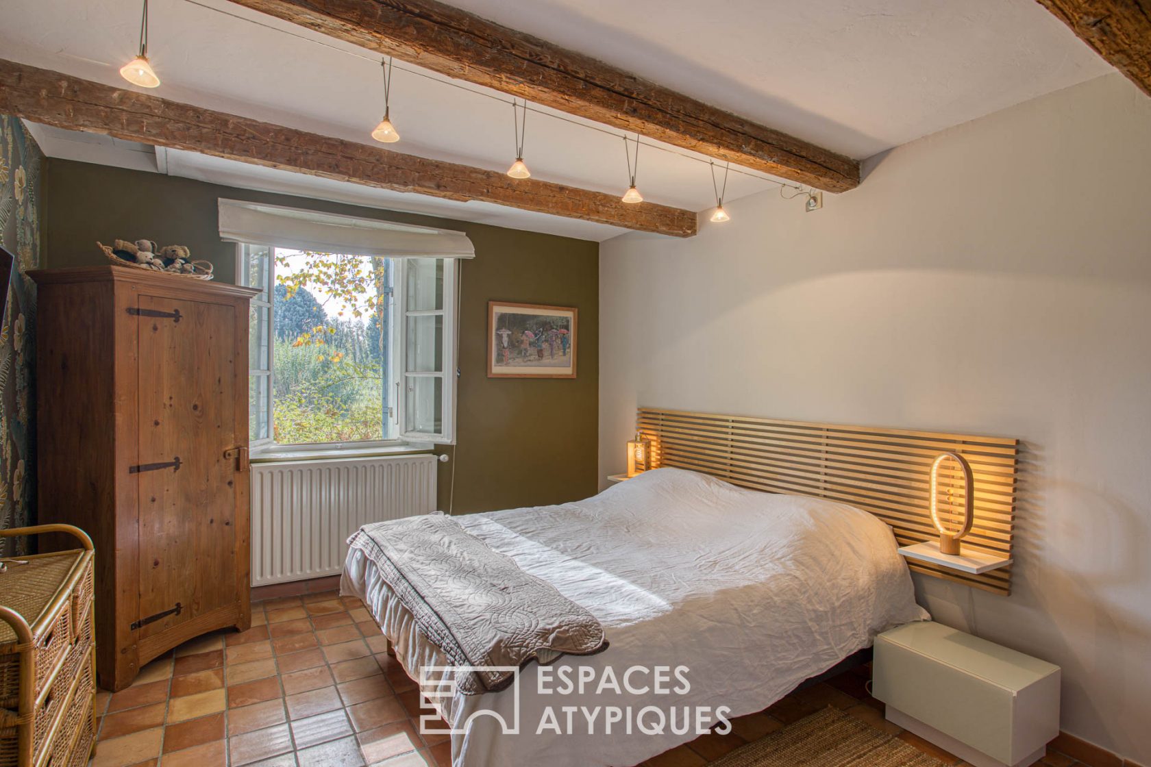 Old renovated farmhouse with wooden cabin