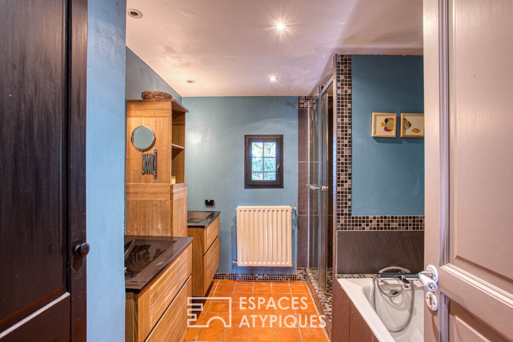 Old renovated farmhouse with wooden cabin