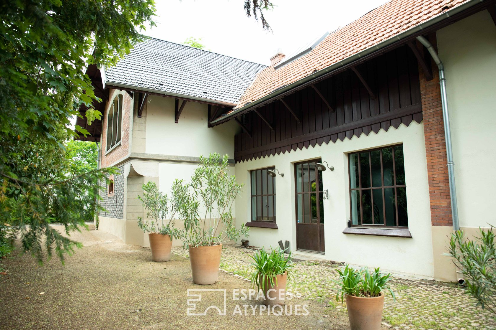 Large contemporary house with renovated old orangery