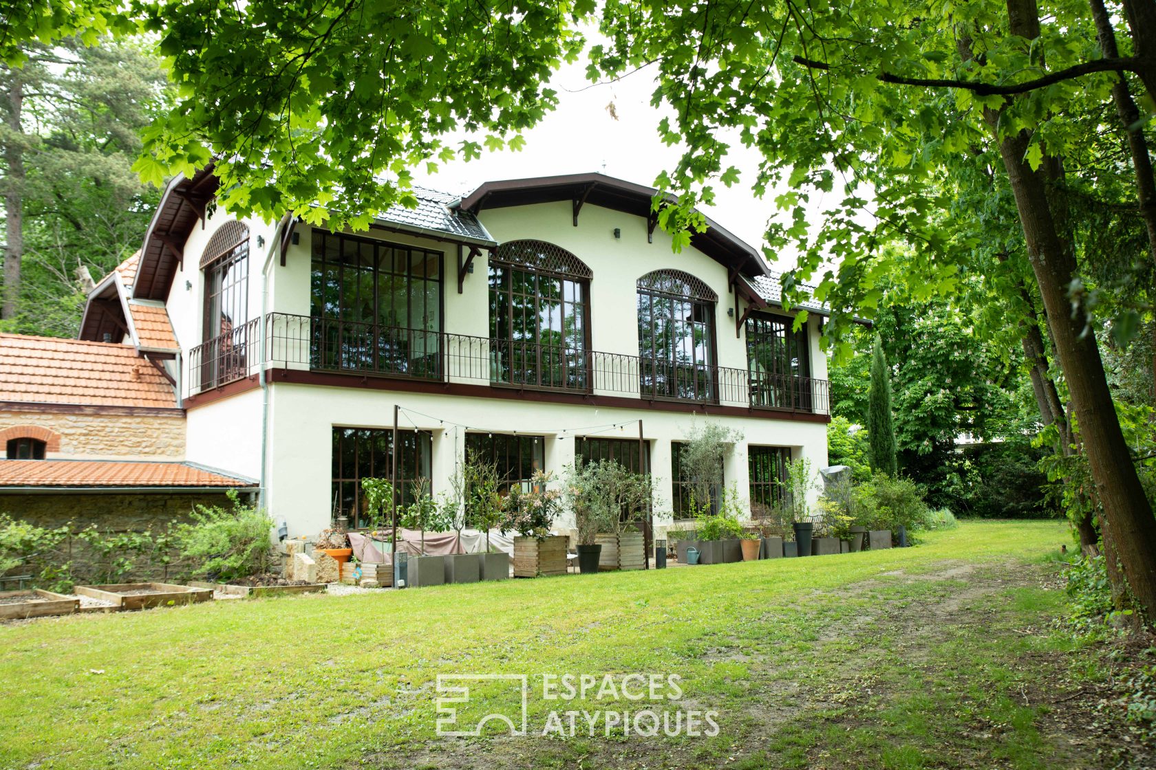 Large contemporary house with renovated old orangery