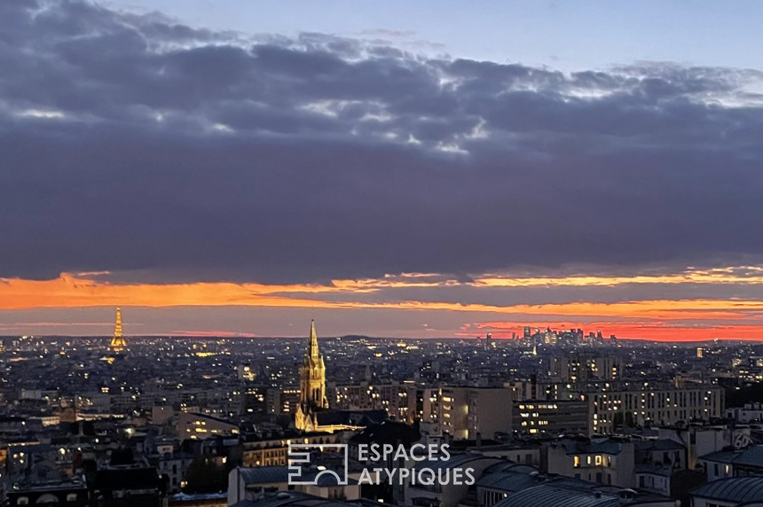 Appartement avec une grande terrasse et une vue sur Paris
