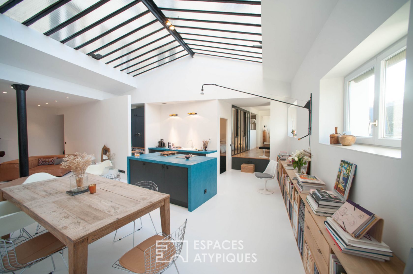 Architect’s loft under glass roof