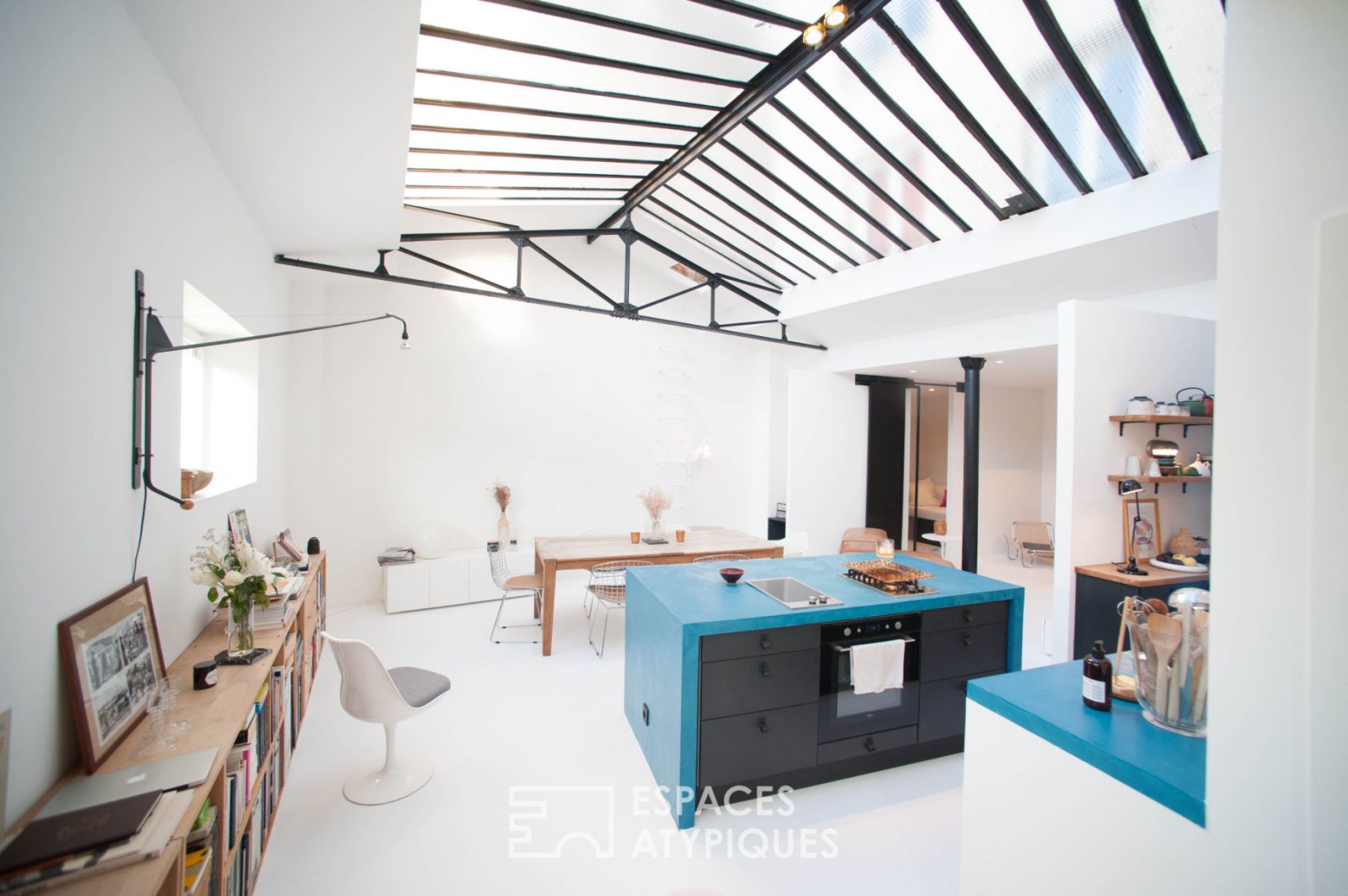 Architect’s loft under glass roof