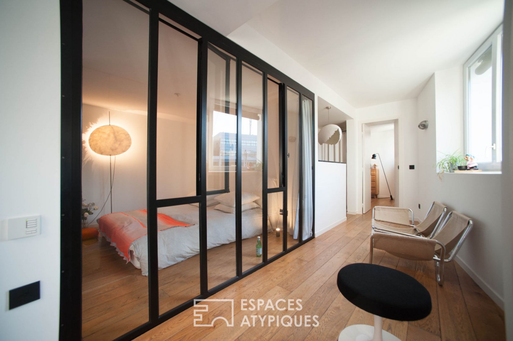 Architect’s loft under glass roof