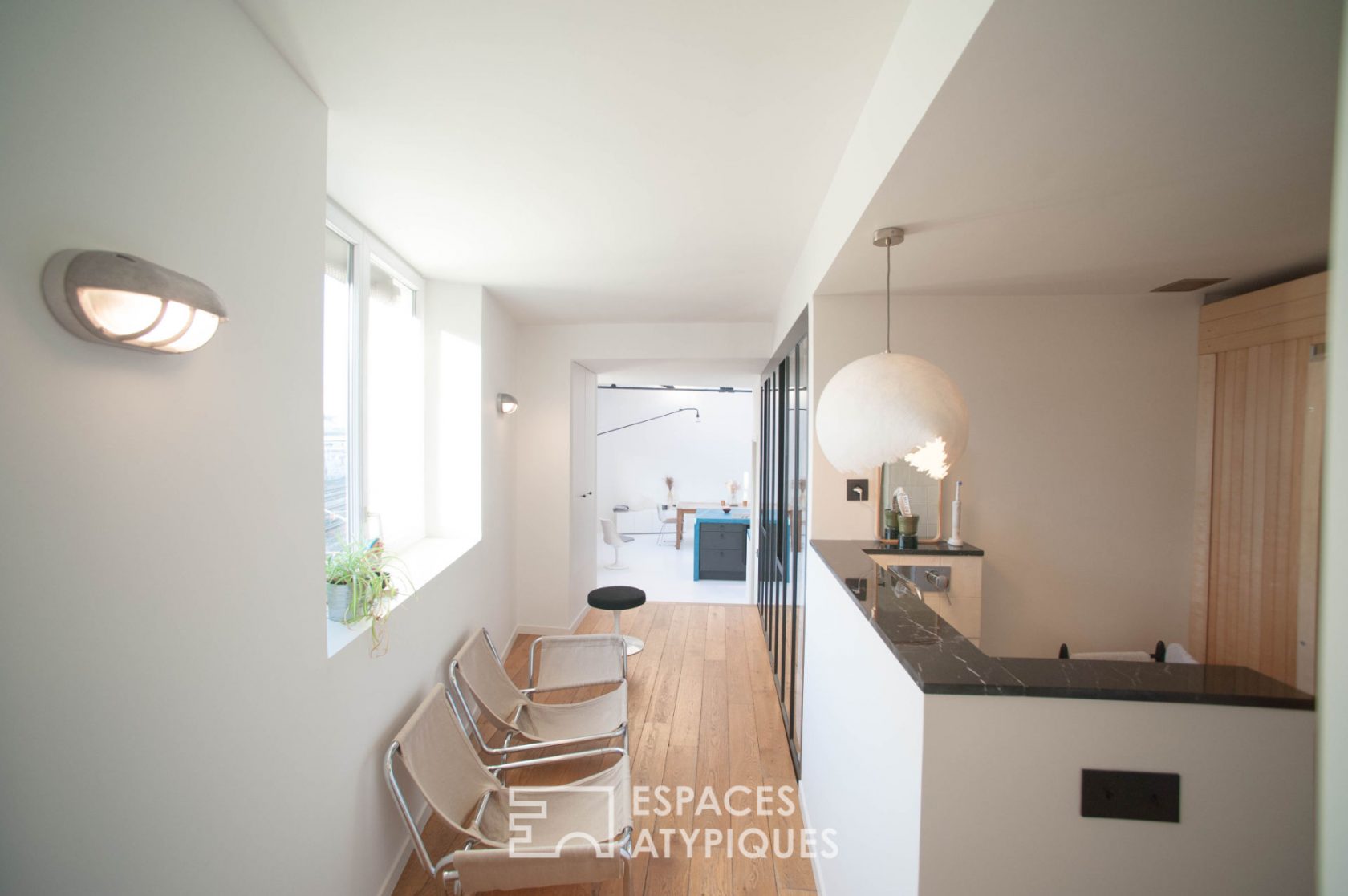 Architect’s loft under glass roof