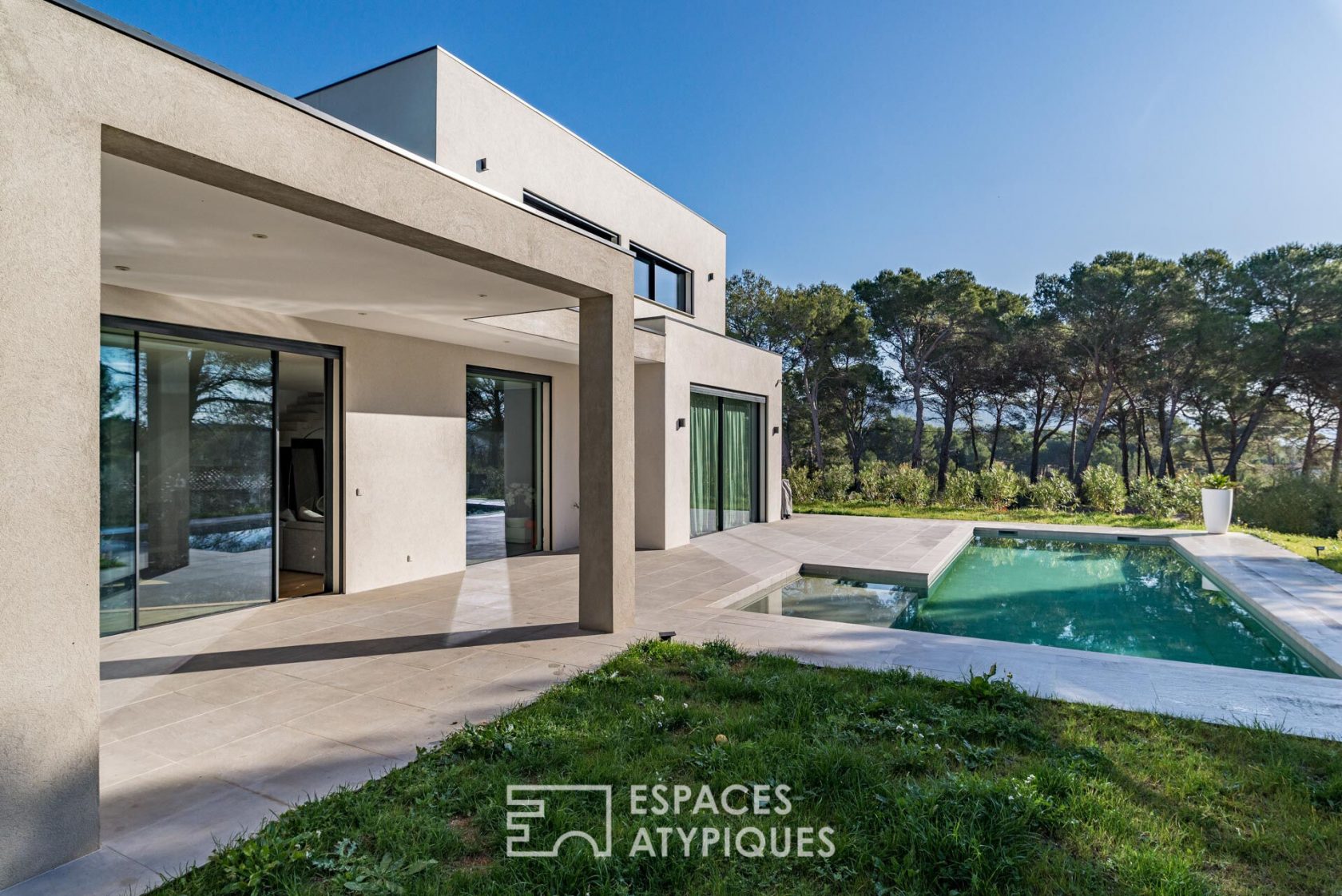 Contemporary architect’s house with view on pine forest