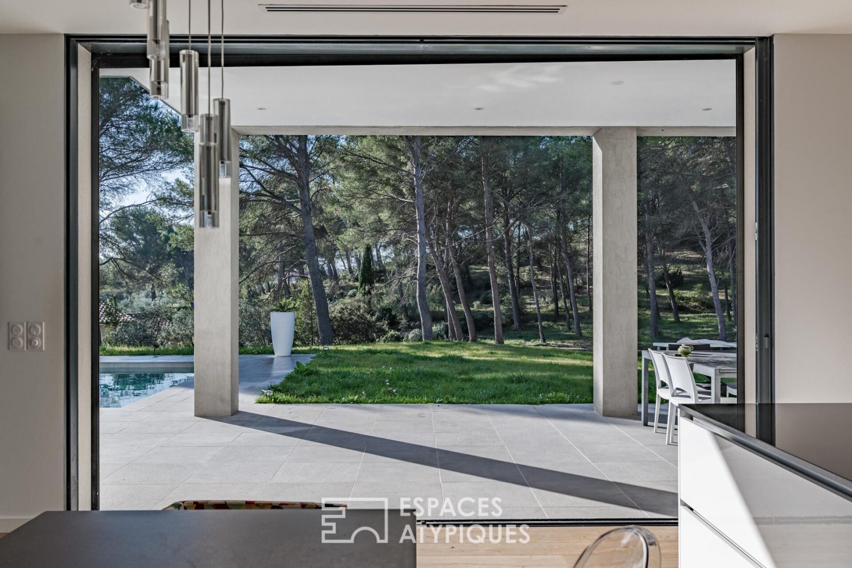 Contemporary architect’s house with view on pine forest