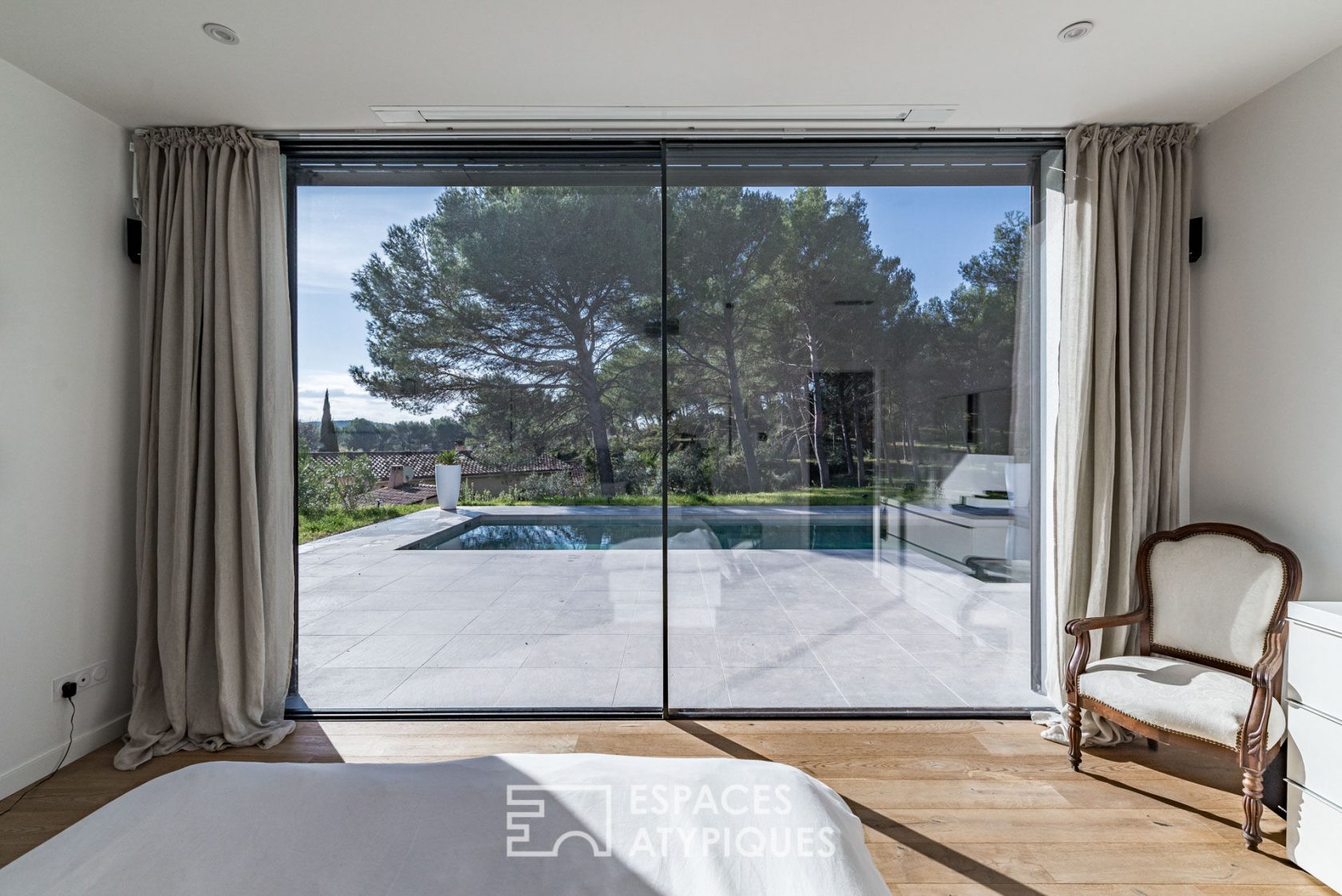 Contemporary architect’s house with view on pine forest
