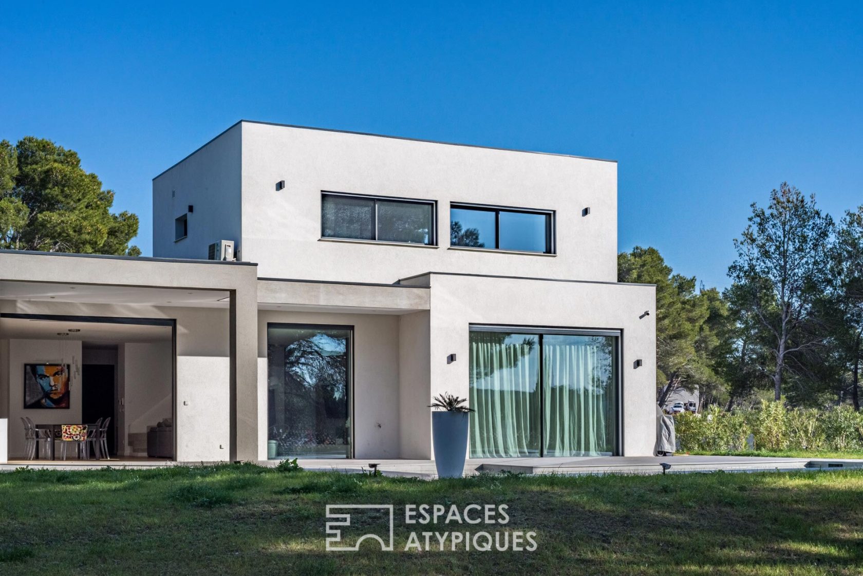 Contemporary architect’s house with view on pine forest