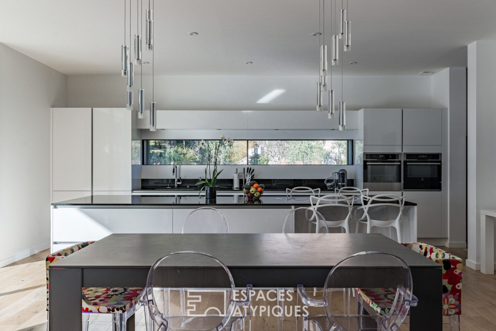 Contemporary architect’s house with view on pine forest