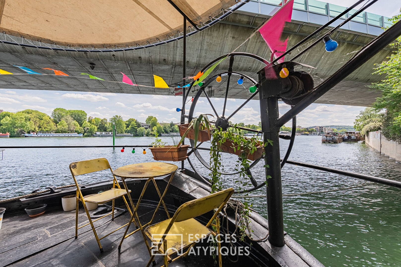 Barge with view on the seine at the gates of Paris