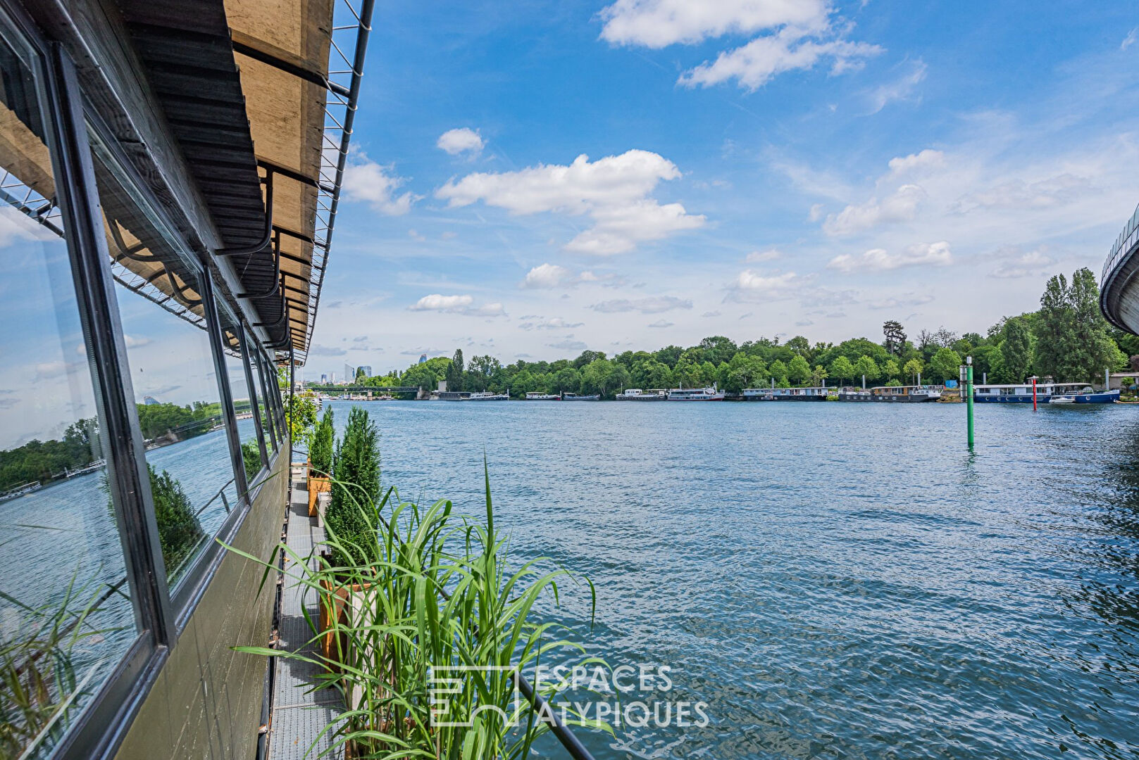 Barge with view on the seine at the gates of Paris