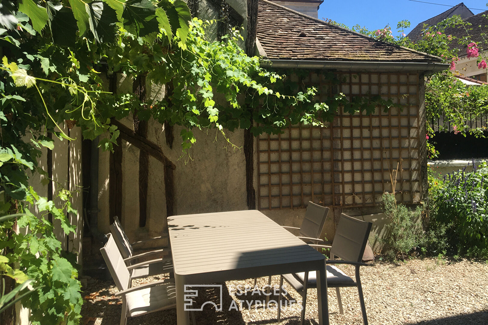 Half-timbered house and its flower garden