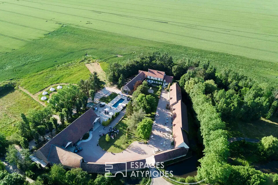 Ancienne ferme avec ses espaces verdoyants