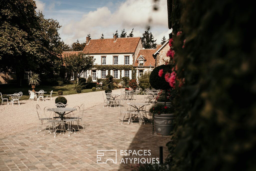 Ancienne ferme avec ses espaces verdoyants