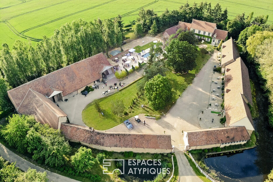 Ancienne ferme avec ses espaces verdoyants