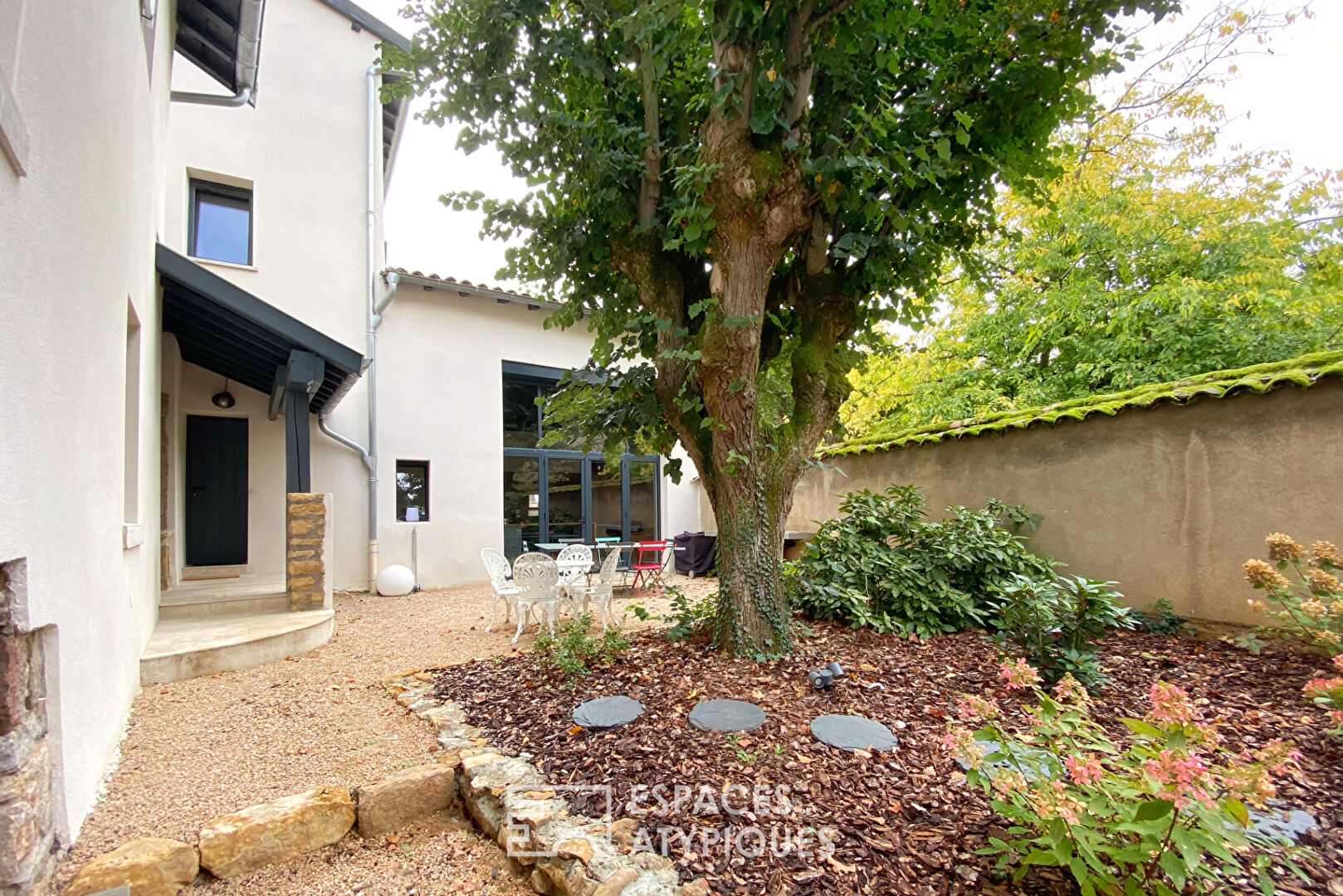 Old and modern house with swimming pool