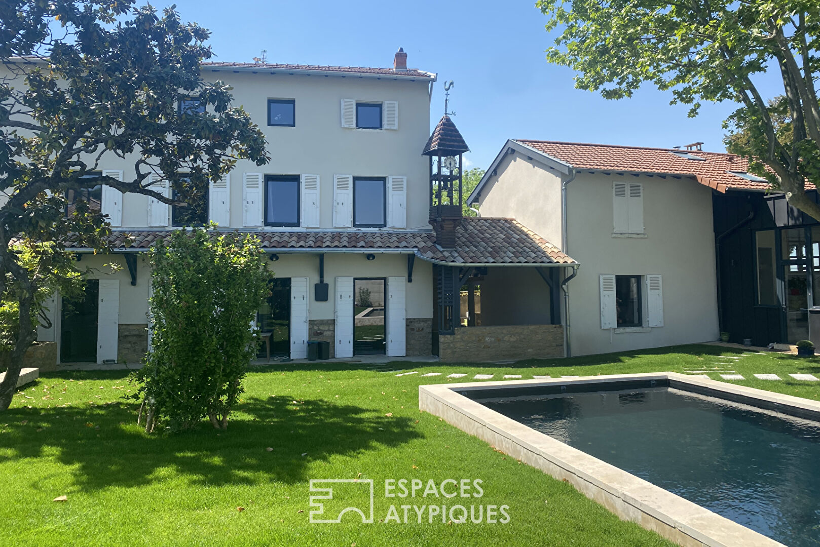 Old and modern house with swimming pool