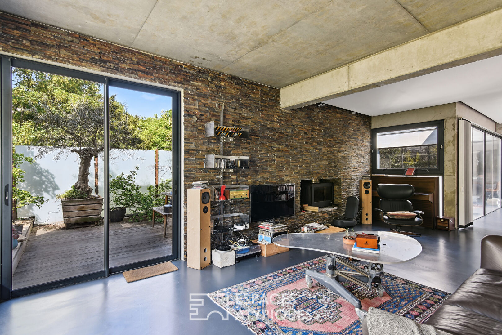 Contemporary raw concrete duplex