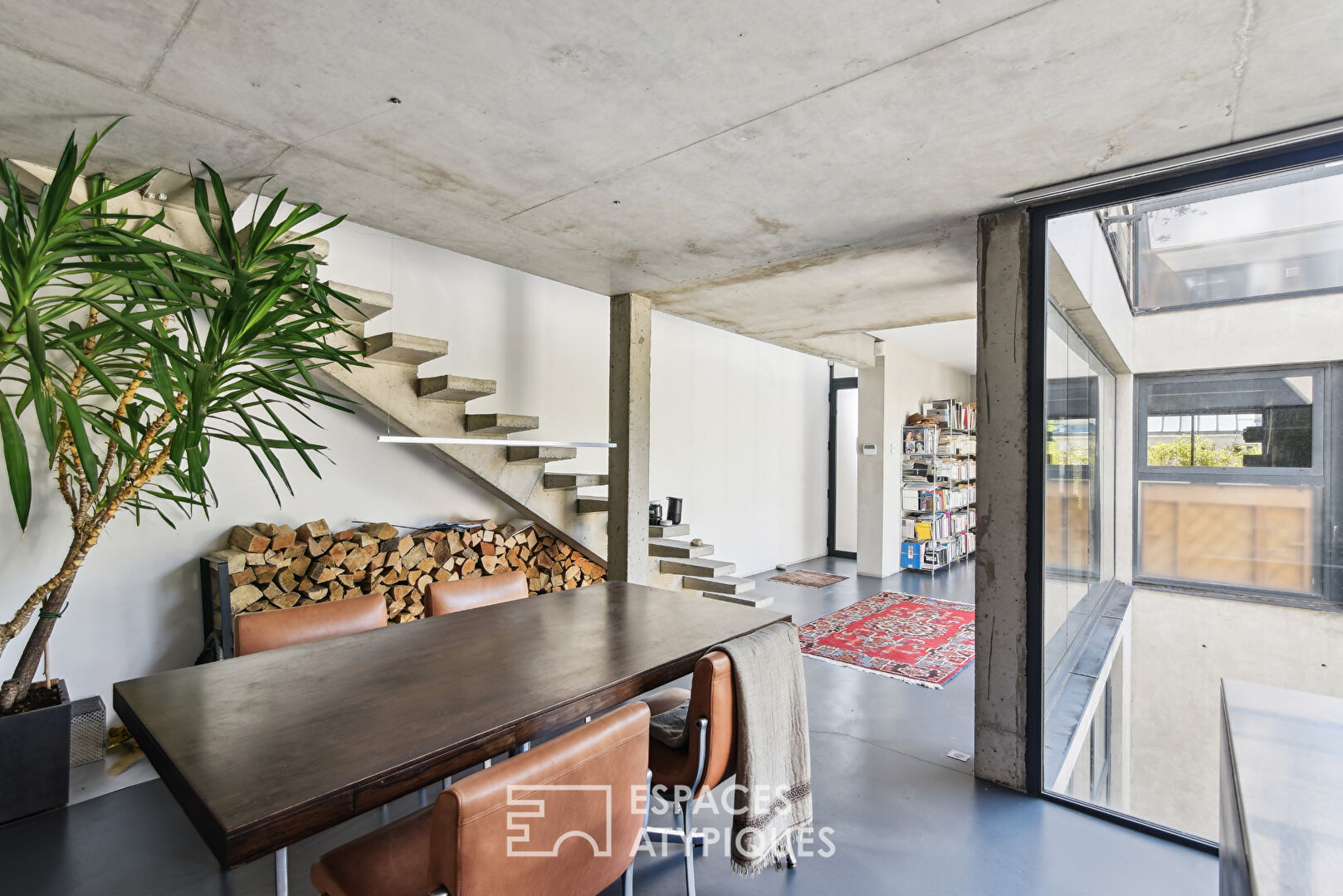 Contemporary raw concrete duplex